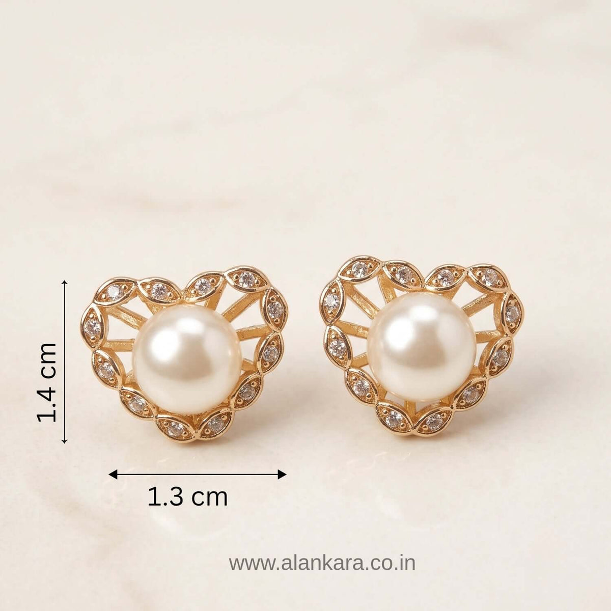 Pearl heart stud earrings with rose gold plating and cubic zirconia, perfect for Indian and western outfits.