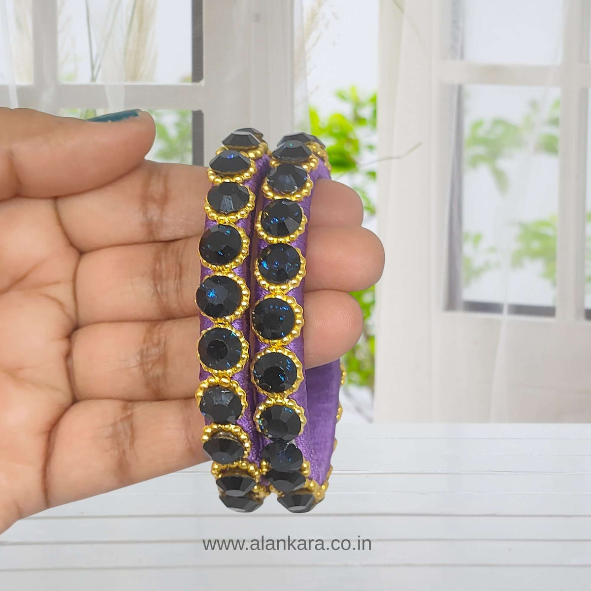 Royal Purple Crystal Silk Thread Kada Bangles featuring purple silk thread, navy-blue crystals, and golden beads.