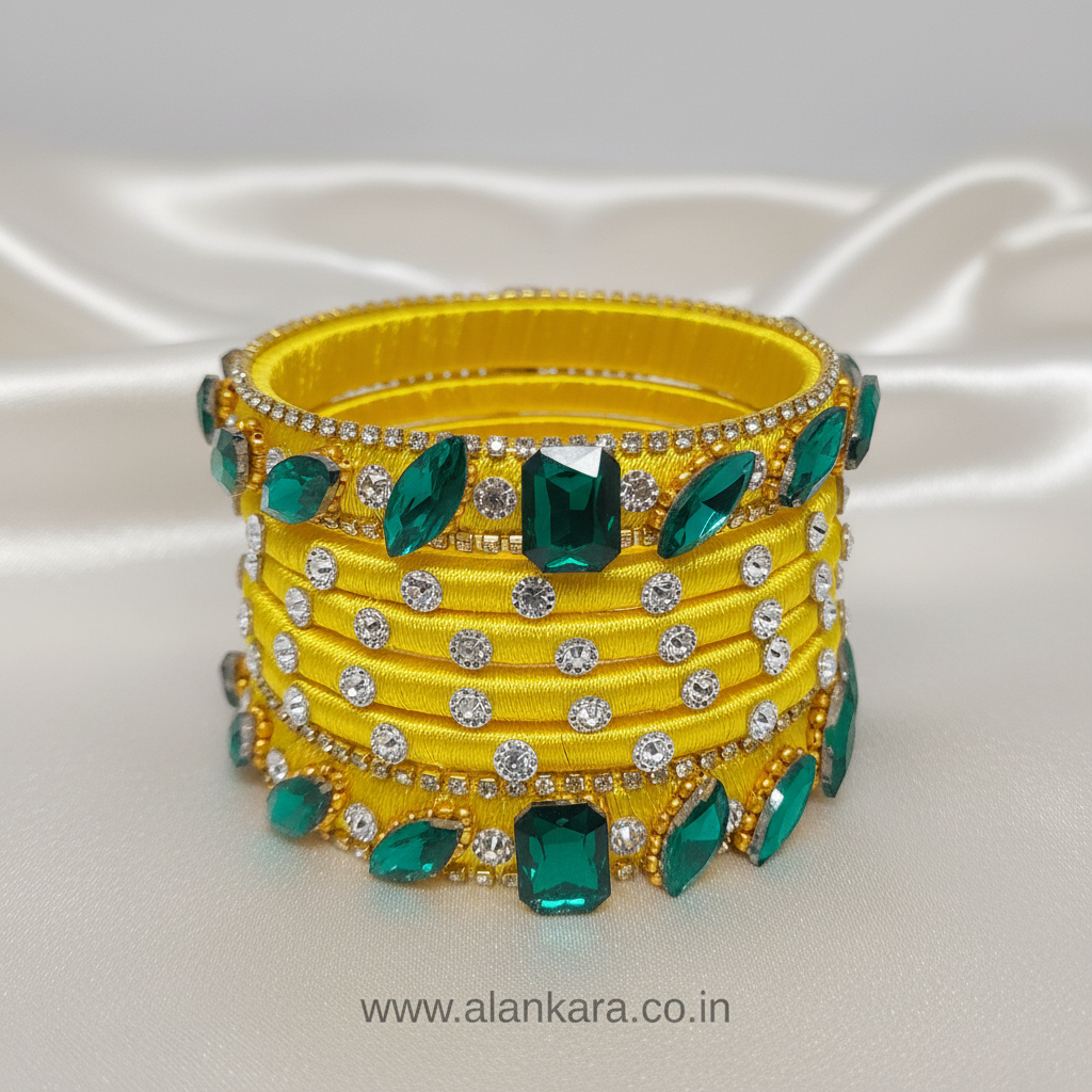 Yellow & Green Noori Silk Thread Bangles adorned with sparkling green crystals and American diamonds.