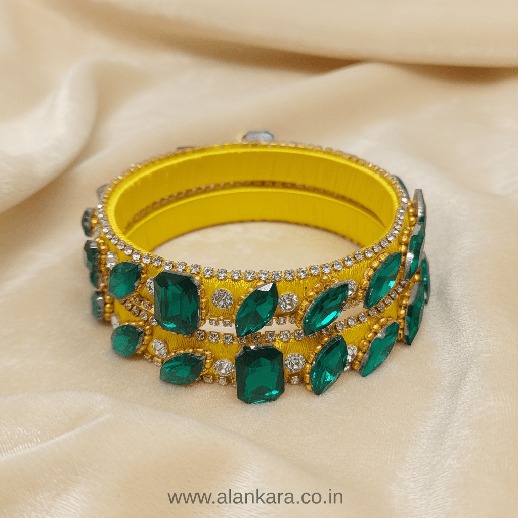 Yellow & Green Noori Silk Thread Kada Bangles with emerald-green stones and sparkling crystals.